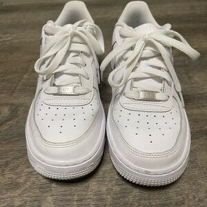 White Nike Air forces. Size 5.5 grade School.